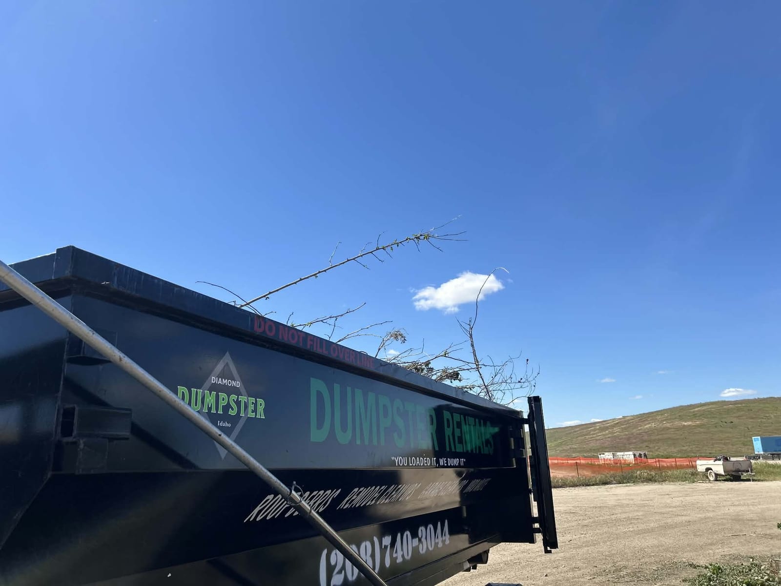 Loaded Diamond Dumpster bin at the transfer station, ready for disposal